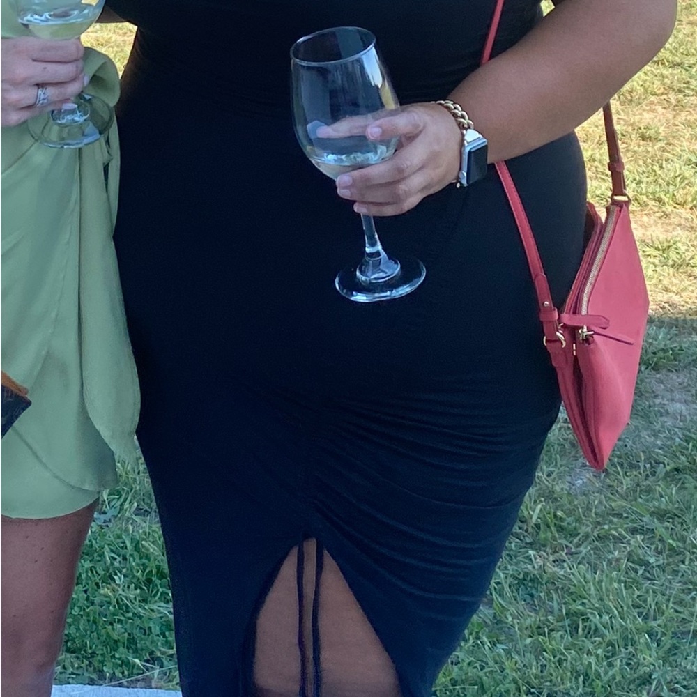 Black Ruched Dress with Red Crossbody Bag